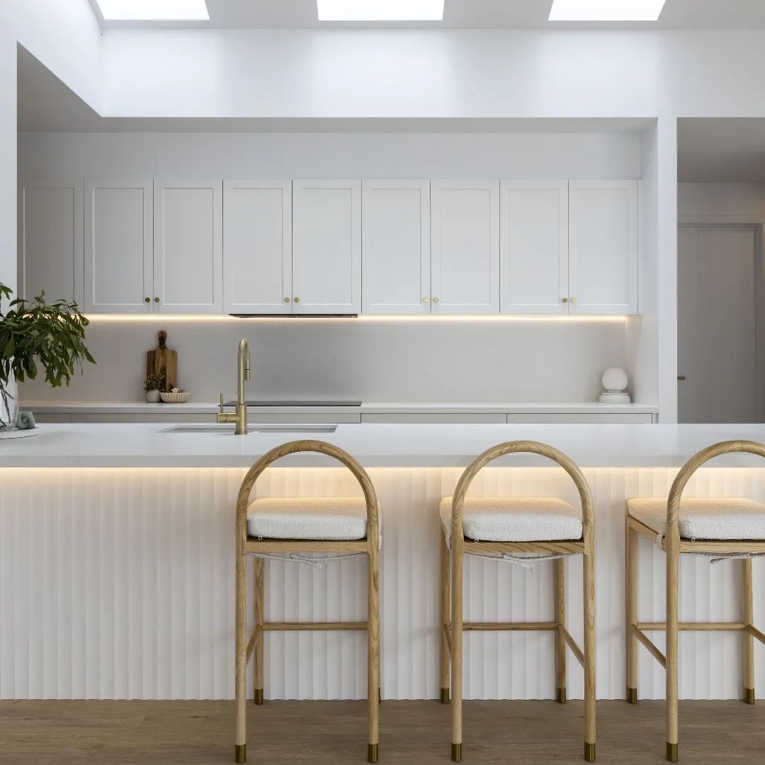 Bright geelong kitchen showing 3 bench seats at stone breakfast bar<br />
