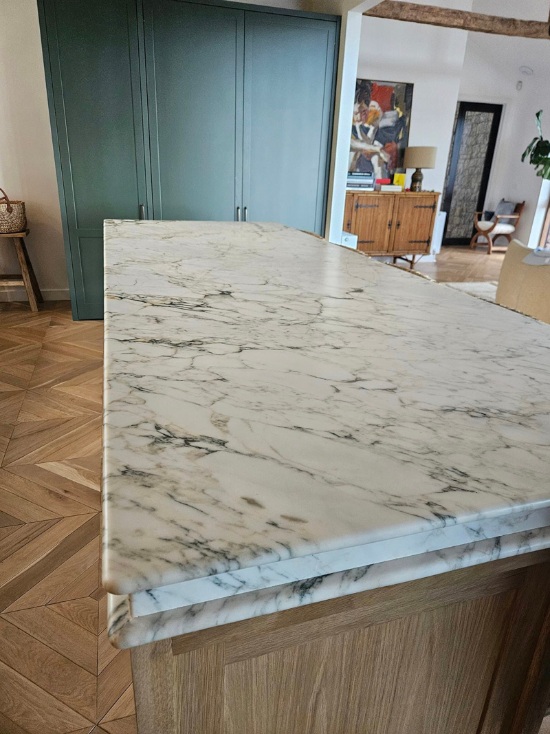 Close up photo of the white marble kitchen benchtop